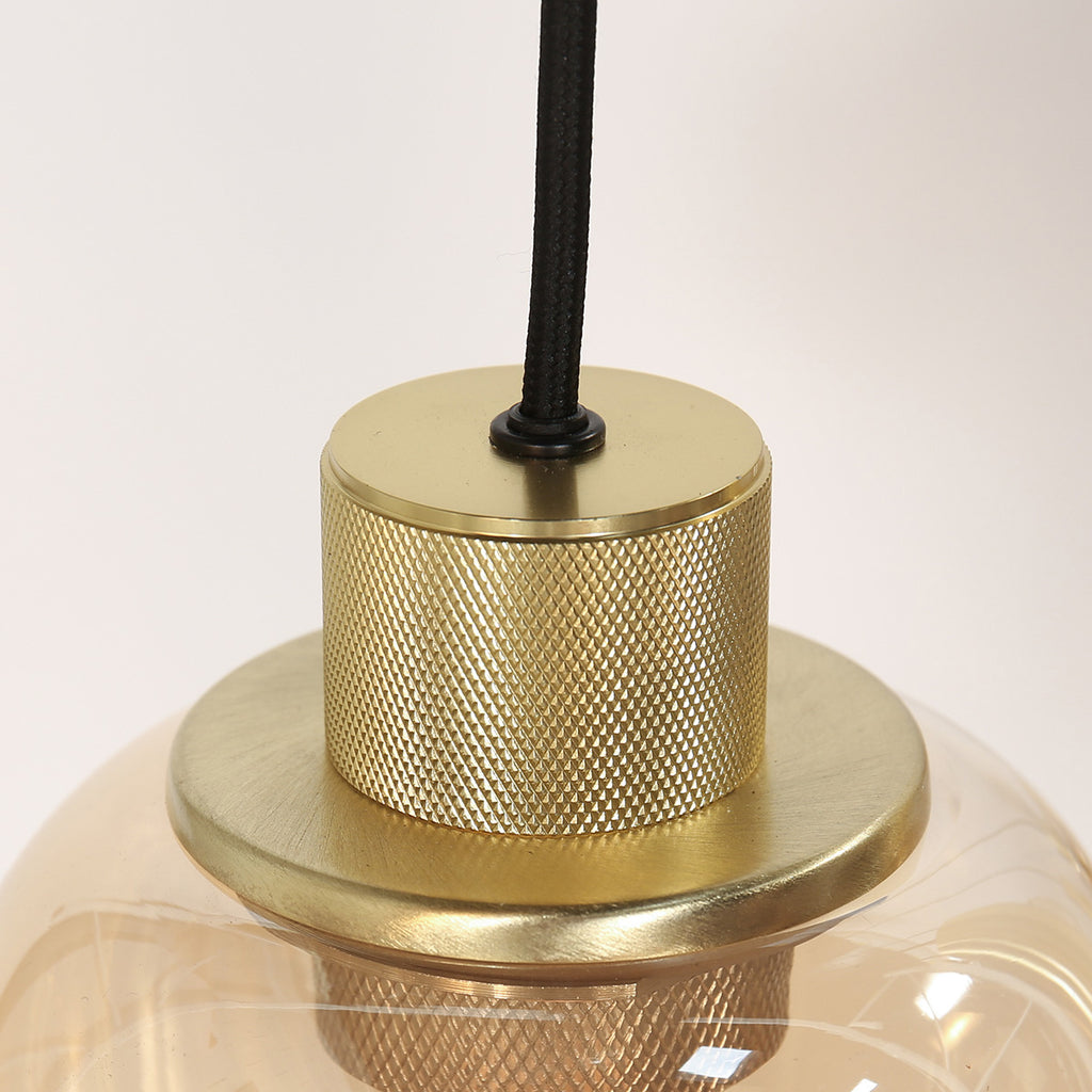 Suspension multiple en verre ambré et laiton doré pour éclairage chaleureux – 140x44 cm