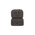Porte-bougie totem en grès noir sculpté avec motifs géométriques