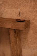 Porte-encens en teck racine finition naturelle forme ronde