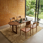 Table à manger bois massif brun piètement sculptural 180x90 cm