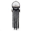 Attrape-rêves mural en macramé noir avec plumes et perles en bois