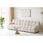 Canapé modulaire crème en peluche avec coussins ronds segmentés