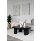 Table basse ovale noire aux pieds cylindriques épais, cadre blanc relief géométrique 60x90 cm