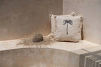 Chapeau de plage naturel en herbe marine beige tissée avec palmier noir