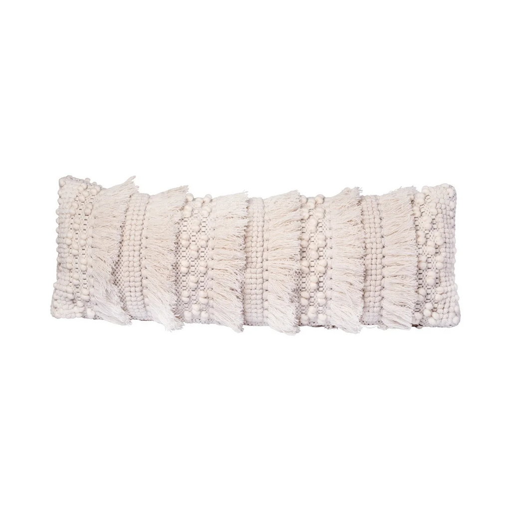 Coussin long en laine écrue avec franges et motifs tuftés, décoration intérieure élégante