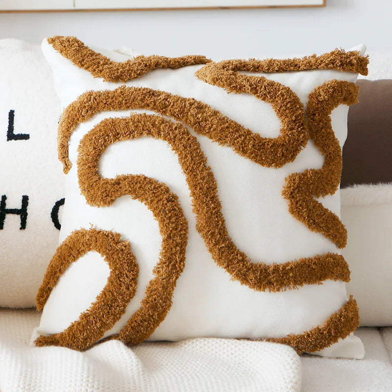 Coussin nordique avec motifs marron en relief