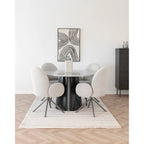 Table ronde moderne avec pied noir et plateau verre, 4 chaises bouclées grises