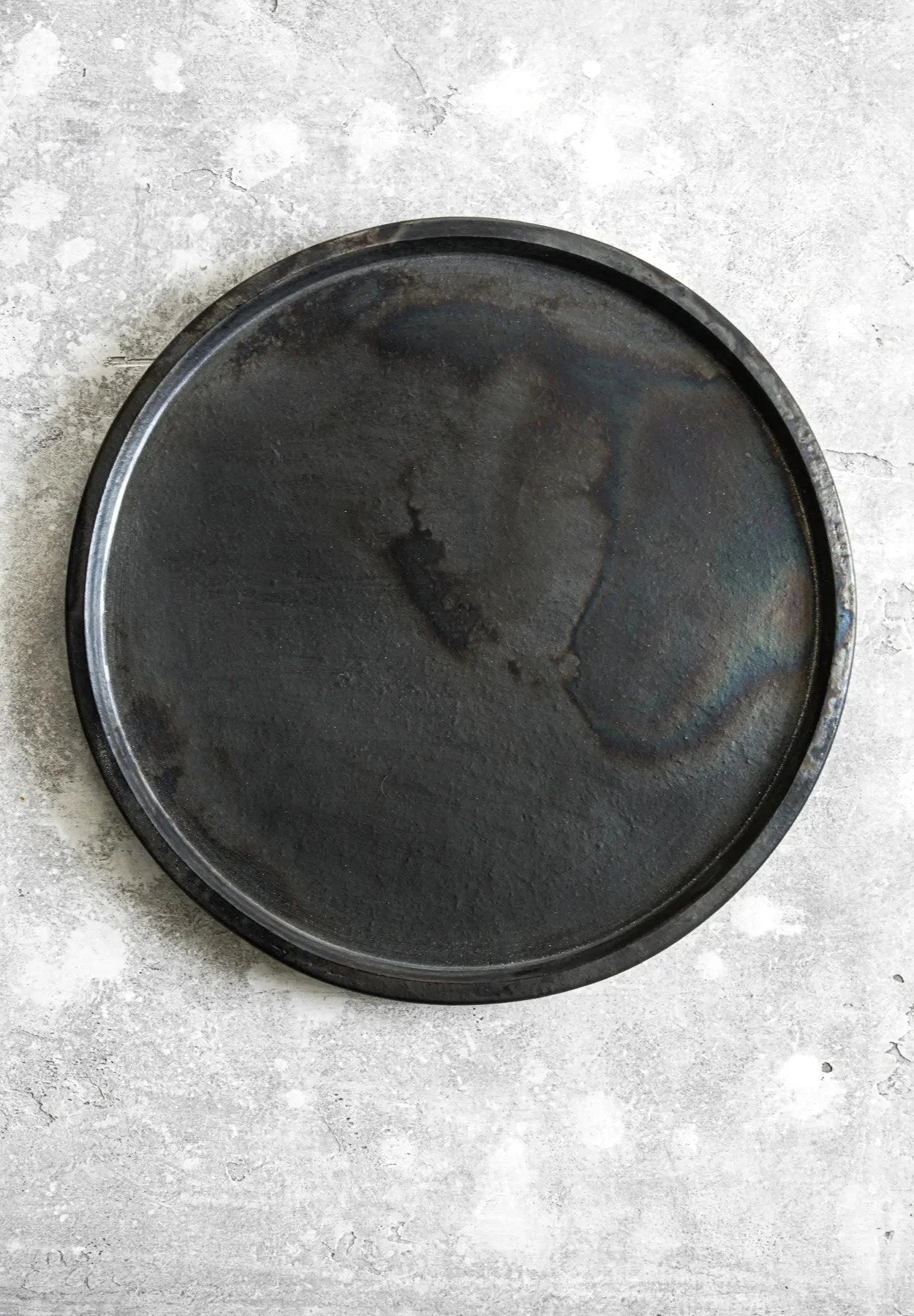 Grille en fonte ronde noire de 30 cm pour cuisson parfaite