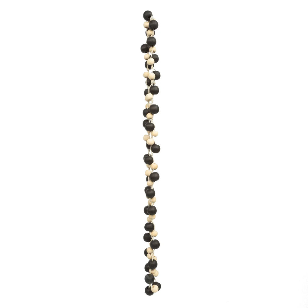 Guirlande murale en perles de bois noir et naturel torsadées