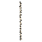 Guirlande murale en perles de bois noir et naturel torsadées