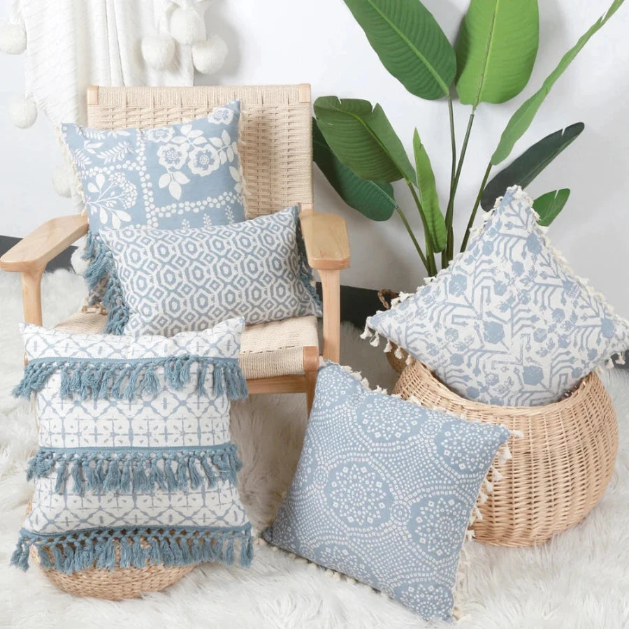 Housse de coussin bleu géométrique