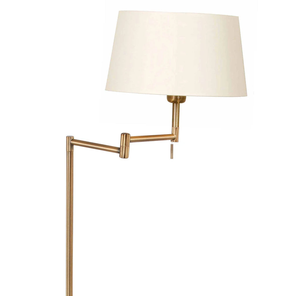 Lampadaire en laiton brossé avec bras pivotant et abat-jour en tissu blanc