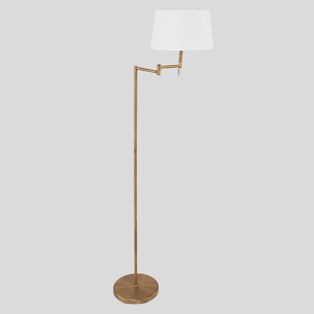 Lampadaire en laiton brossé avec bras pivotant et abat-jour en tissu blanc
