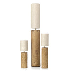 Trois lampes à poser cylindriques en papier mâché organique boue, H40 cm, tons terre