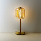 Lampe de table en laiton brossé et verre nervuré ambré H32 cm