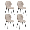 Lot de 4 chaises en tissu blanc avec pieds en métal noir, style moderne.