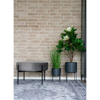 Tabouret ottoman en velours gris avec pieds en métal noir