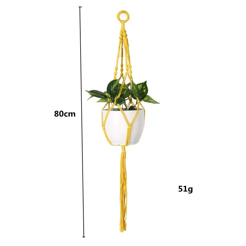 Suspension plante en macramé jaune moderne avec pot blanc et plante verte