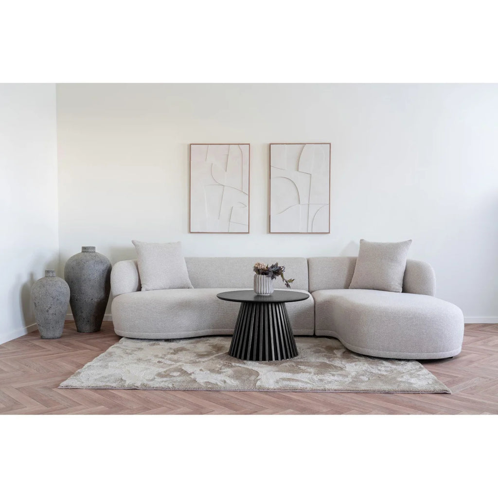 Canapé sectionnel beige moderne aux contours arrondis