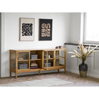 Buffet en bois clair avec portes vitrées et étagères ouvertes, affichant boîtes et objets décoratifs