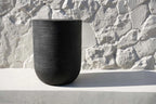 Tabouret cylindre en bois de suar noir sculpté – H45 cm