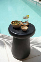 Tabouret cylindrique en bois de suar noir au design minimaliste – H45 cm
