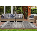 Tapis ethnique rectangulaire tissé taupe et crème avec motif extérieur gris et blanc