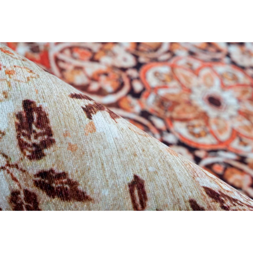 Tissu texturé avec motif floral marron et crème, fond flou orange et noir pour Tapis oriental rectangulaire à médaillon tons terracotta et beige