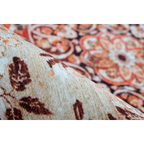 Tissu texturé avec motif floral marron et crème, fond flou orange et noir pour Tapis oriental rectangulaire à médaillon tons terracotta et beige