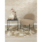 Fauteuil beige texturé en peluche avec pieds en métal noir
