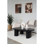 Table basse ovale noire avec pieds cylindriques épais, toile déco 50x70 cm marron et beige
